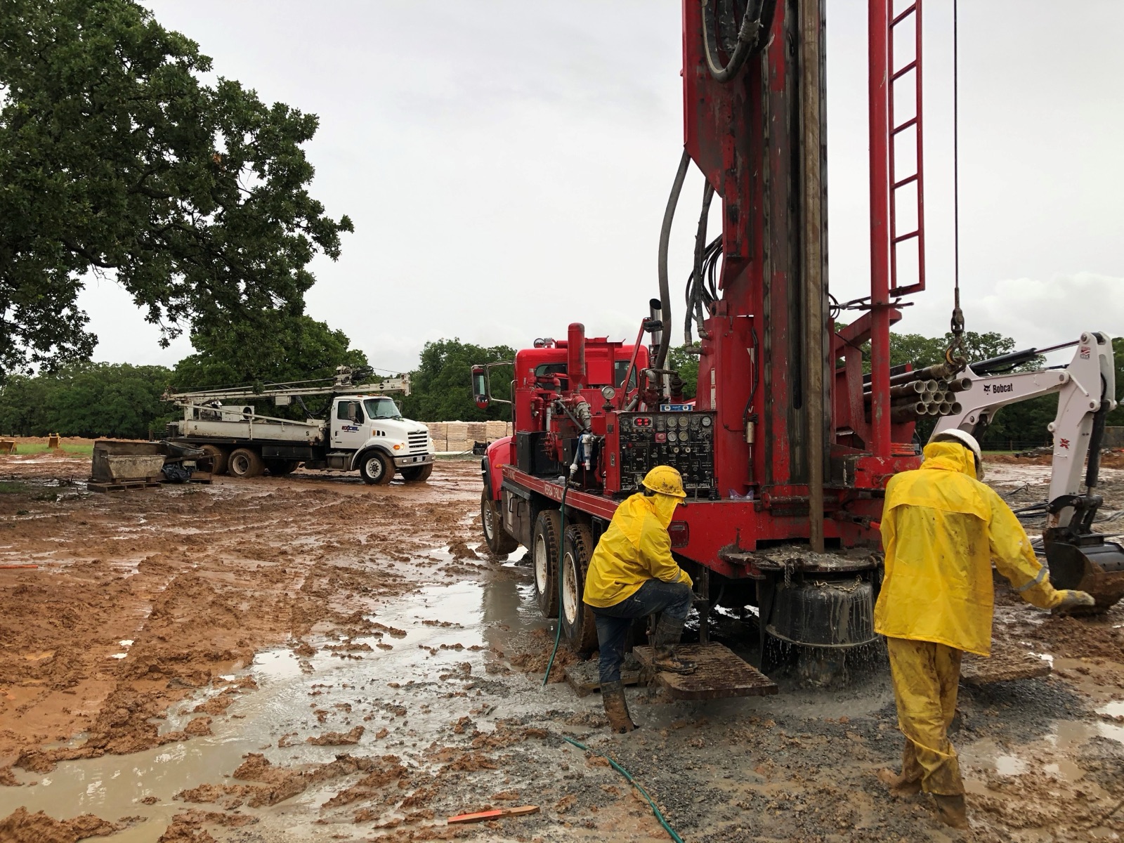 Excel Geothermal crew operating a drilling rig on a residential geothermal well in DFW